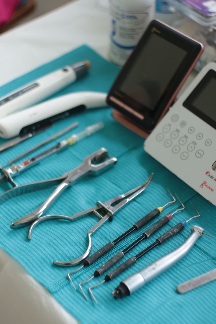 services-04 Dental tools and equipment neatly arranged for a procedure in a modern clinic.