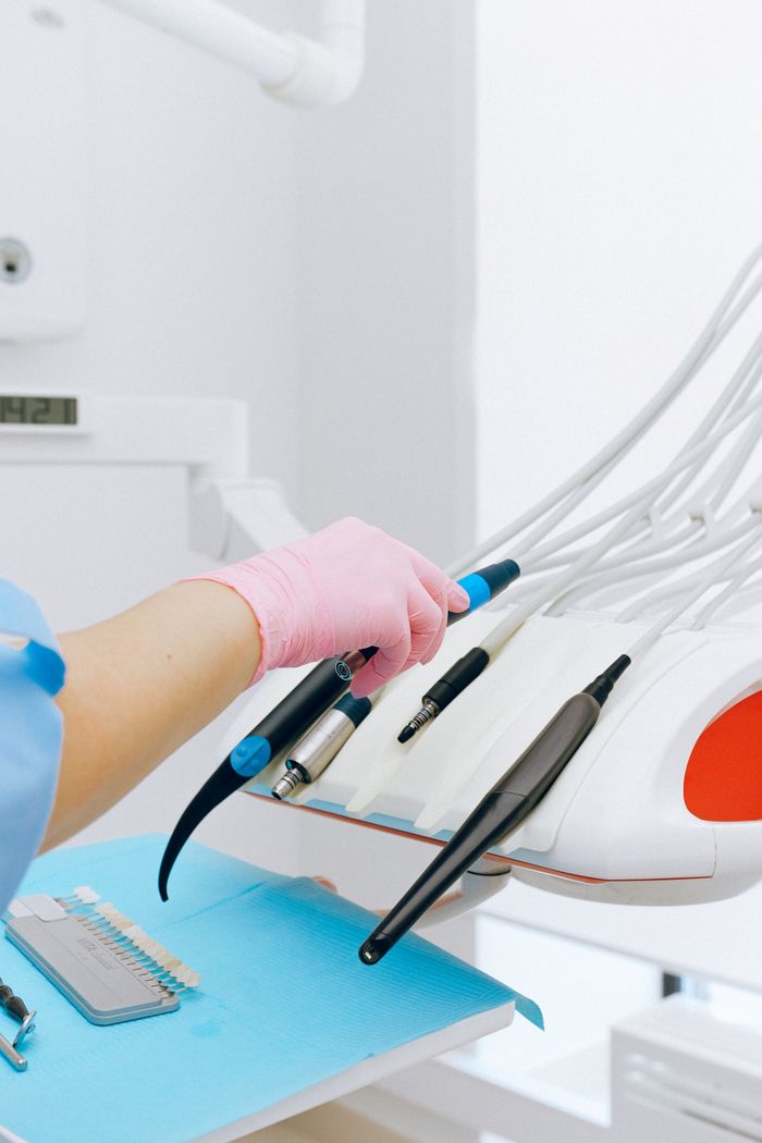 who-we-are Close-up of dental tools and technology in a sterile clinic environment.